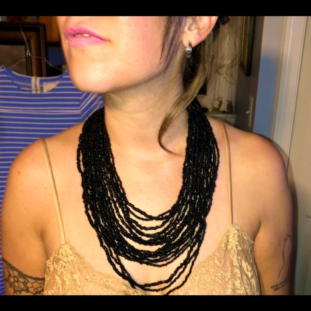 EUC like new multi-beaded strands with wooden clasp